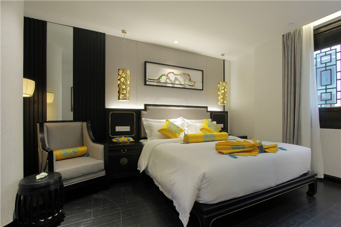 勃朗中式酒店装修企业推荐望月中式酒店客房设计方案